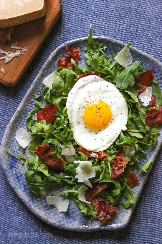 Arugula Salad With Crispy Proscuitto, Parmesan And Fried Eggs