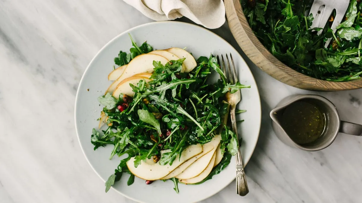 Arugula With Pomegranates, Blue Cheese And Pistachios