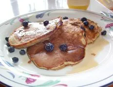 Banana Pecan Pancakes Served With Berries