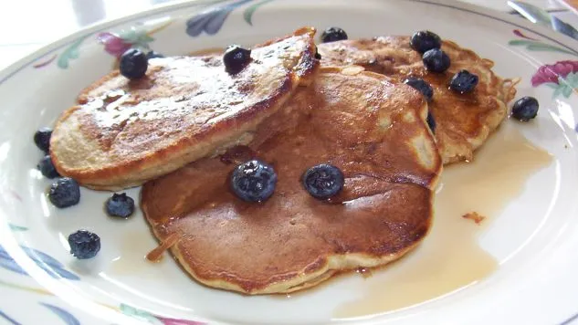 Banana Pecan Pancakes Served With Berries