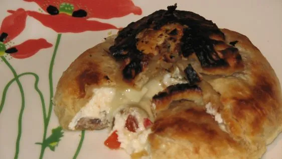 Brie En Croute Stuffed With Olives & Roasted