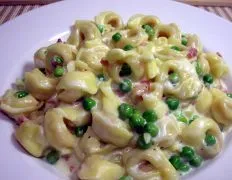 Cheesy Tortellini with Prosciutto in a Creamy Sauce