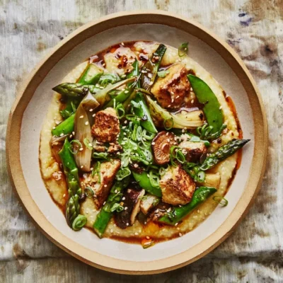 Chili Glazed Tofu Over Asparagus And