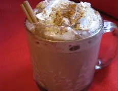 Cinnamon-Spiked Hot Chocolate With Whipped Cream Peaks