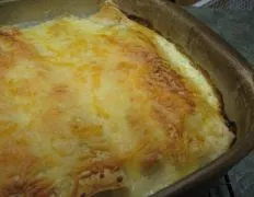 Creamy Chicken Enchiladas in Homemade White Sauce