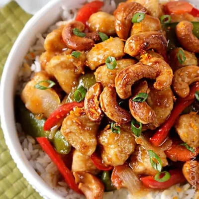 Crispy Cashew Chicken With A Sweet And Spicy Glaze