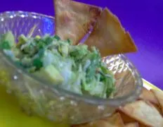 Crispy Tortilla Triangles Paired With Fresh Avocado Salsa Recipe