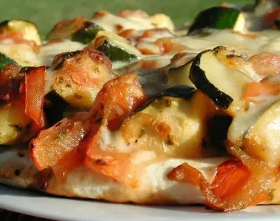 Fresh Tomato And Zucchini Pizza Delight