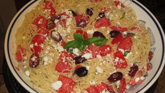 Garlic-Infused Spaghetti with Juicy Tomatoes and Black Olives