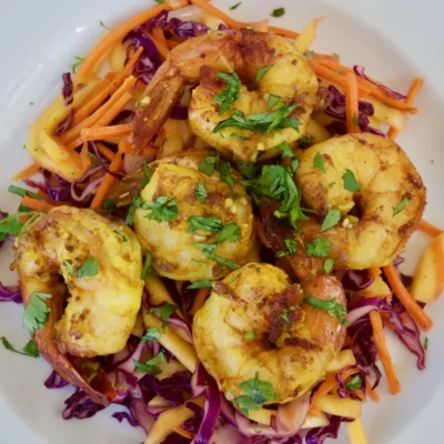 Garlic-Turmeric Shrimp With Mango Cabbage Slaw Recipe