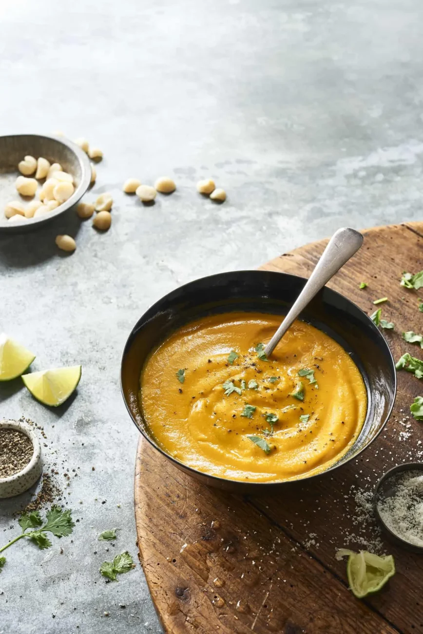 Golden Turmeric Sweet Potato Soup with Crunchy Macadamia