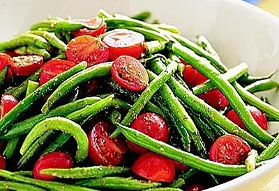 Green Beans And Tomatoes In A Pesto