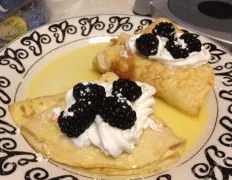 Hot Whiskey Crepes With Raspberries