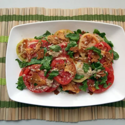 Juicy Tomatoes Drizzled In Homemade Vinaigrette Dressing