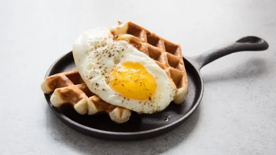 Maple Syrup Fried Eggs On Waffles