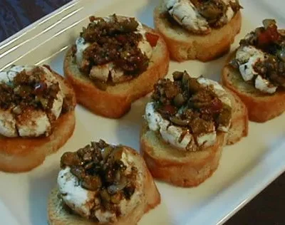 Marinated Goat Cheese Rounds With Crostini