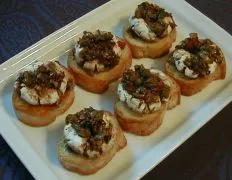 Marinated Goat Cheese Rounds With Crostini