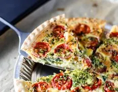 Mediterranean-Style Feta, Spinach, and Tomato Quiche Recipe