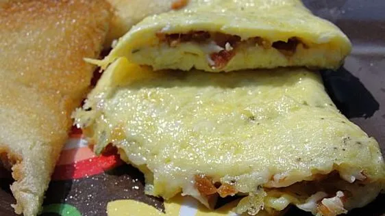 Omelet With Bacon And Parmesan Cheese