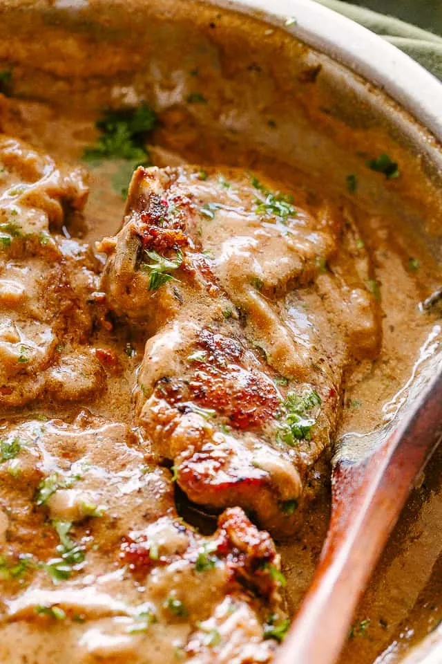 Onion And Garlic Smothered Pork Chops