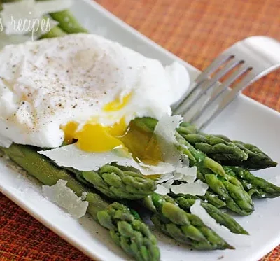 Perfectly Poached Eggs Over Tender Steamed Asparagus