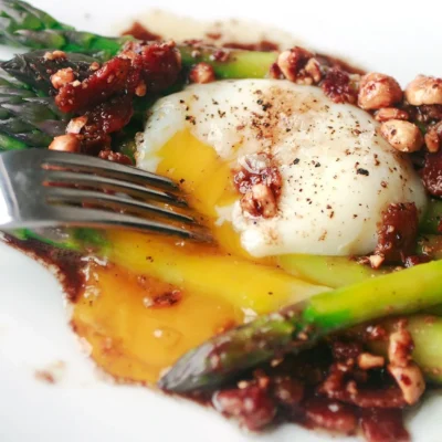 Perfectly Poached Eggs Over Tender Steamed Asparagus