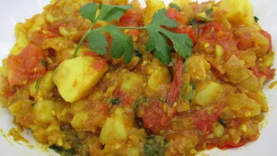 Potatoes With Garam Masala And Spicy Tomato