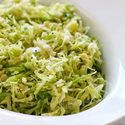 Raw Shredded Brussels Sprouts With Lemon And Oil