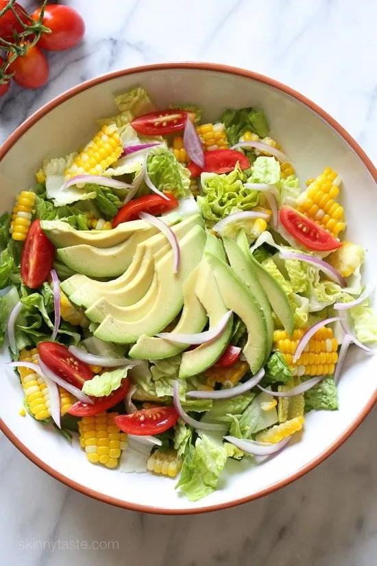 Refreshing Avocado, Corn, and Tomato Salad with Creamy Buttermilk Dressing