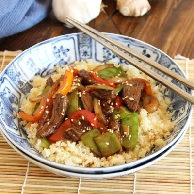 Sizzling Beef Stir-Fry With Cauliflower And Green Peas Recipe