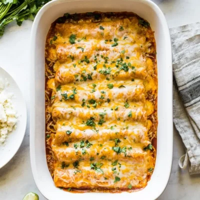 Ultimate Cheesy Chicken Enchiladas: A Crowd-Pleasing Favorite