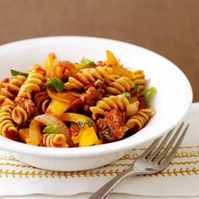 Whole Wheat Linguini With Spicy Sausage And Roasted Bell Peppers Recipe