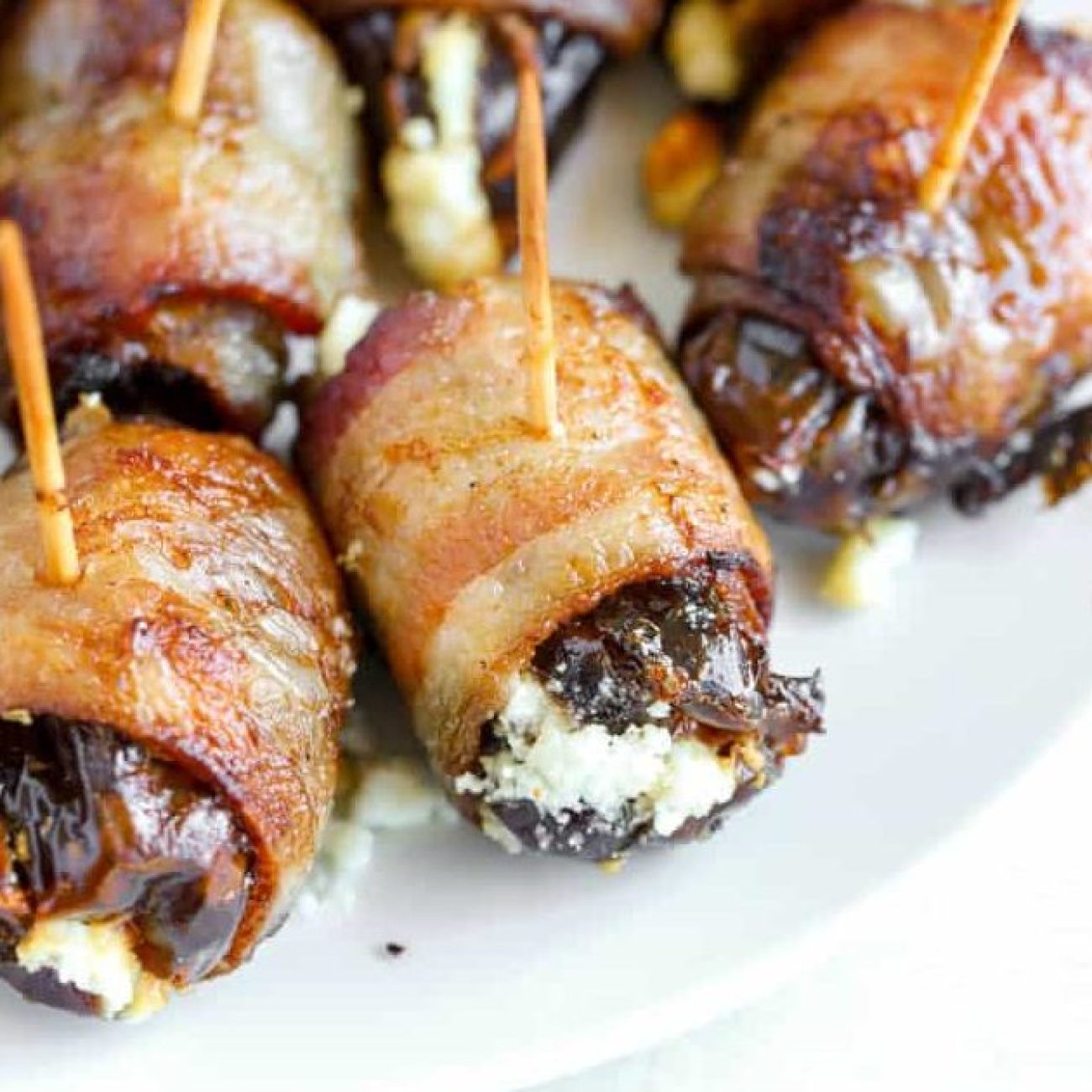 Bacon-Wrapped Dates with Sweet Red Pepper Sauce: A Tapas Delight