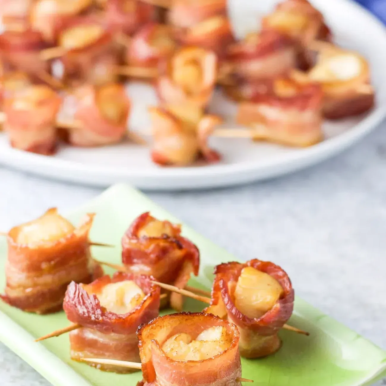 Bacon Wrapped Sea Scallops Served On