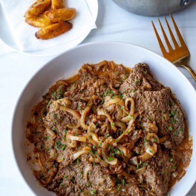 Bistec Encebollado - Steak And