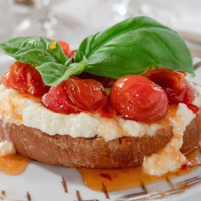 Bruschetta With Ricotta And Olive-Tomato