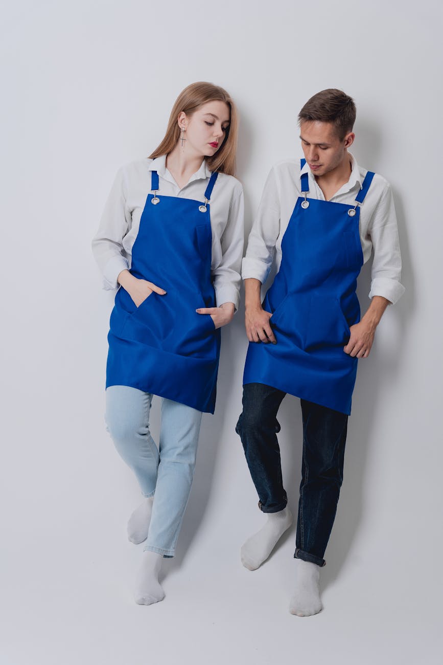 Couple Wearing Blue Aprons