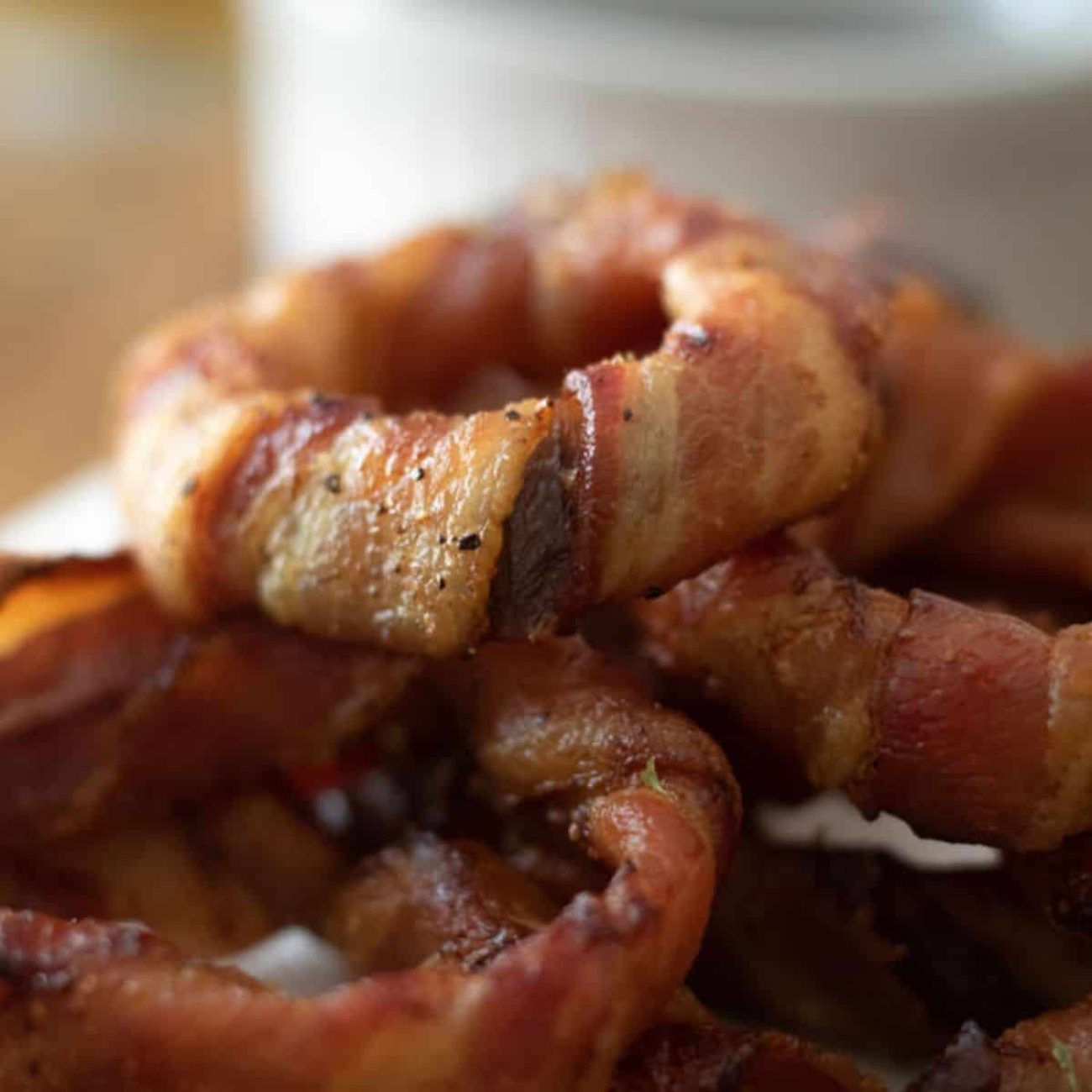 Crispy Sweet and Spicy Bacon-Wrapped Onion Rings