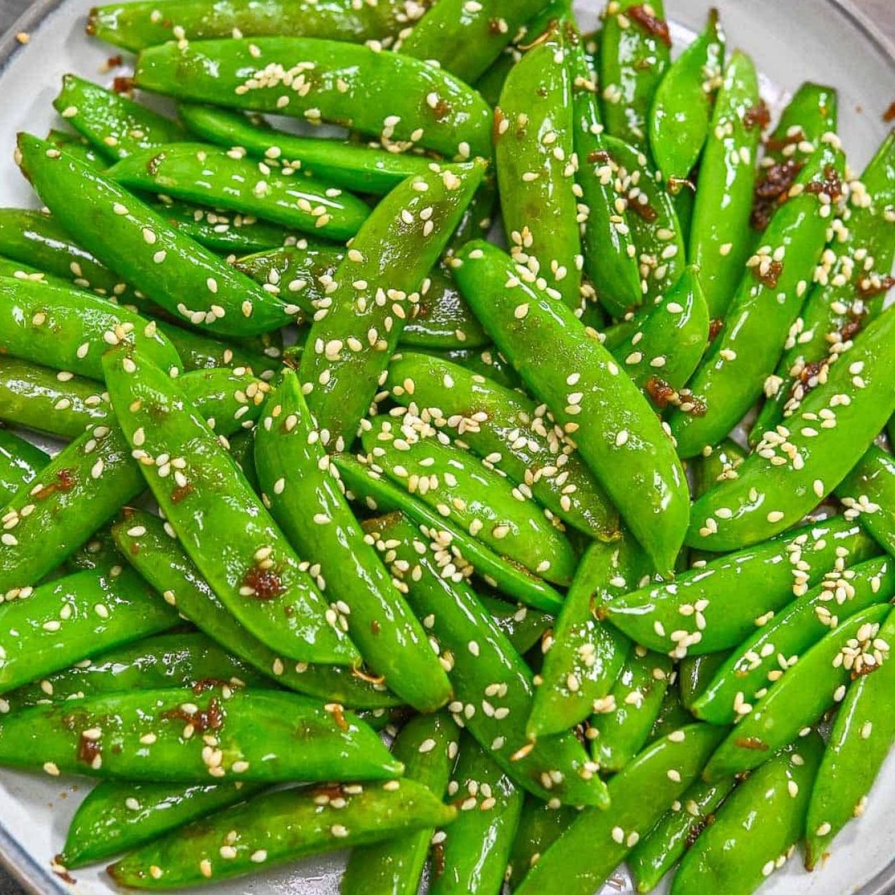 Garlic-Infused Sugar Snap Peas and Cherry Tomatoes Recipe