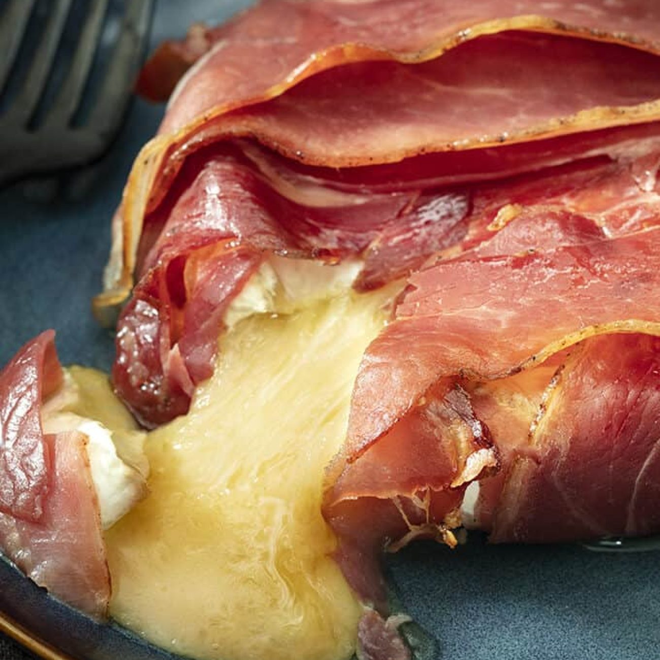 Gourmet Brie and Prosciutto Appetizer with a Brandy Twist