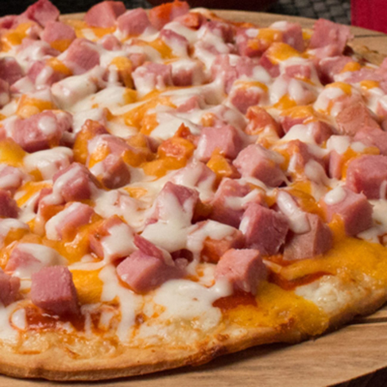 Ham and Swiss Cheese Pizza with Exotic Mango Sauce