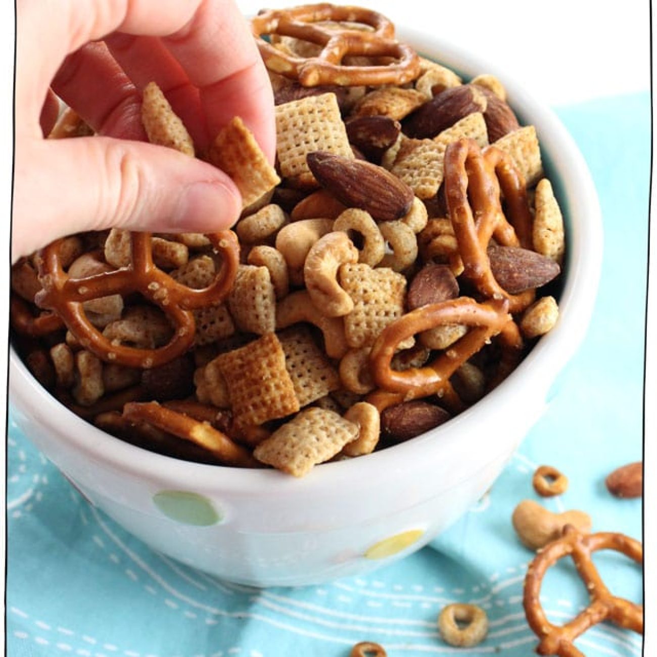 I believe this is the Original Chex Party Mix I found it in a cookbook entitled Best Recipes from the Backs of Boxes