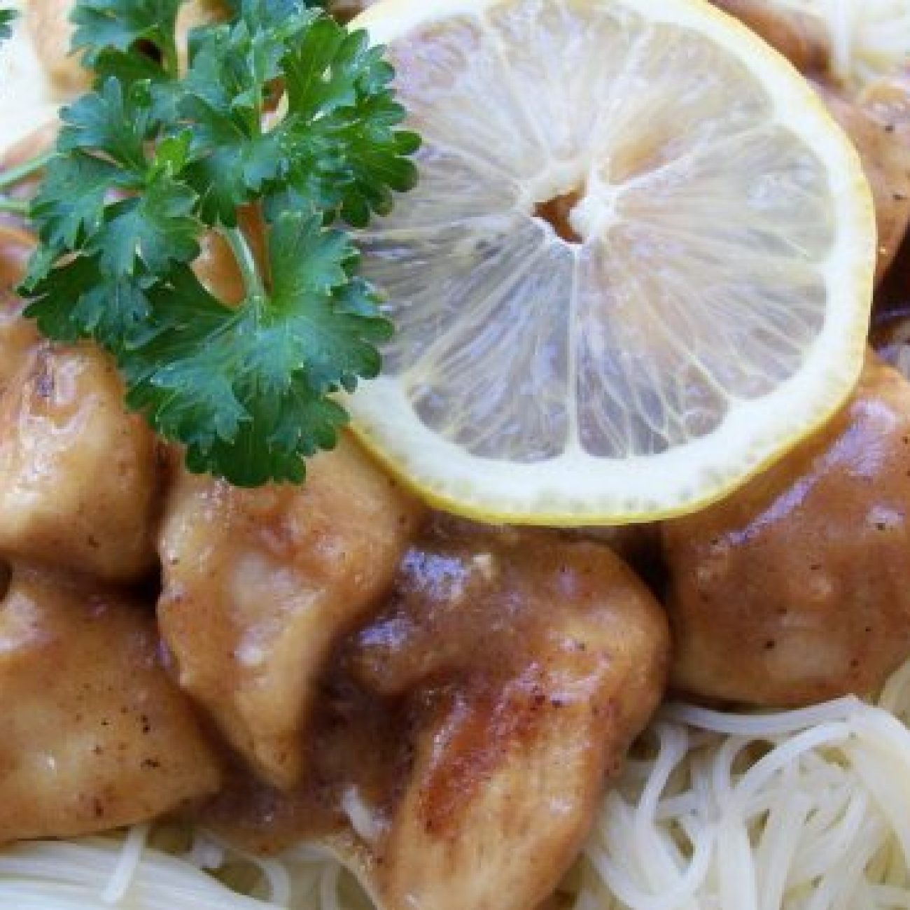 Lemon Garlic Chicken Over Angel Hair Pasta