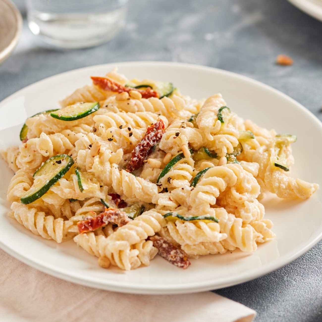 Mediterranean Sun-Dried Tomato and Pine Nut Pasta with Fresh Basil