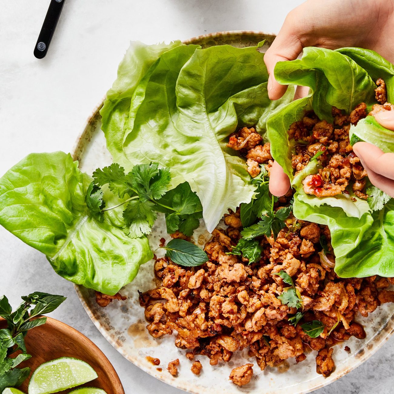 Minced Garlic Chicken Served In Lettuce Leaves