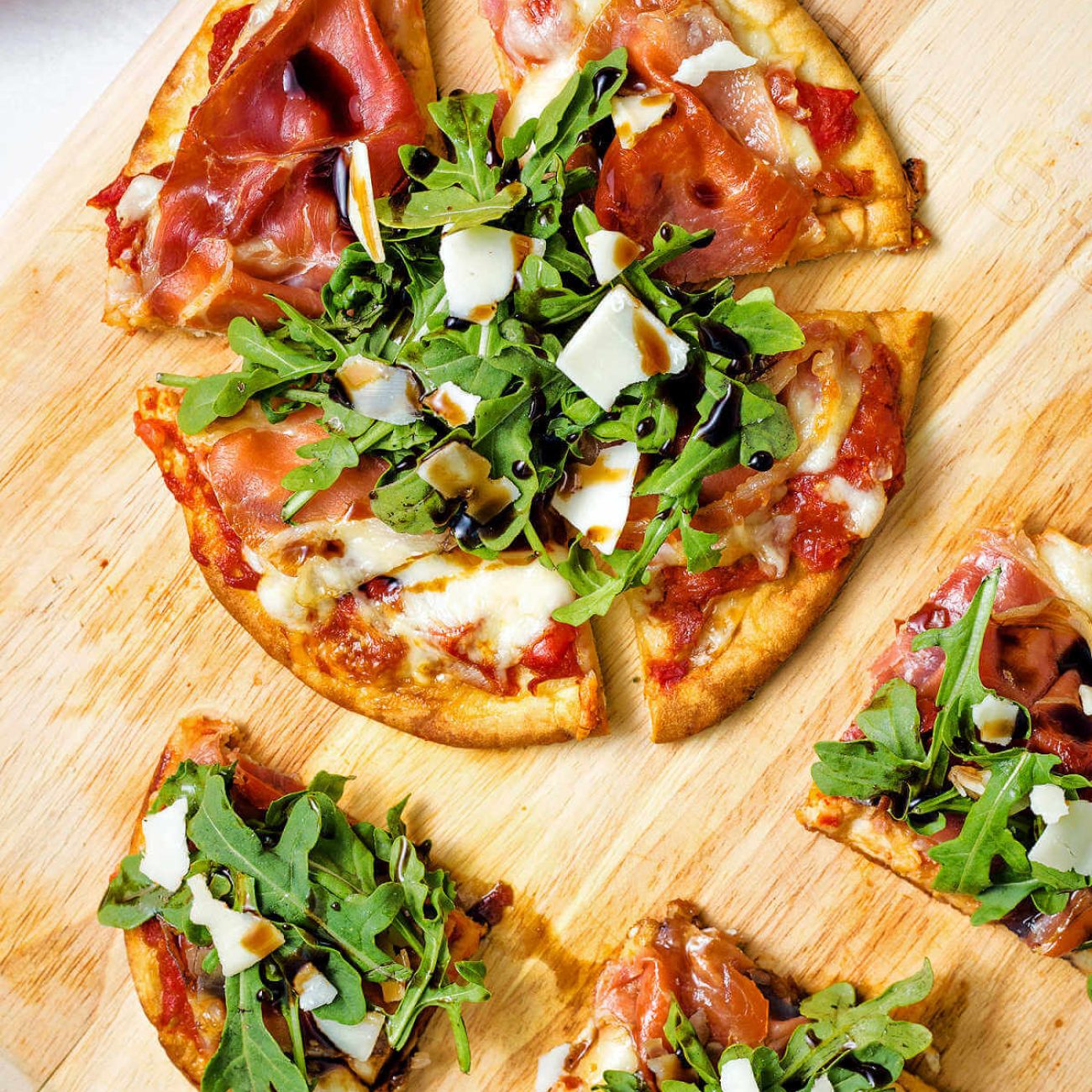 Mini Pizzas With Arugula, Peppers & Prosciutto