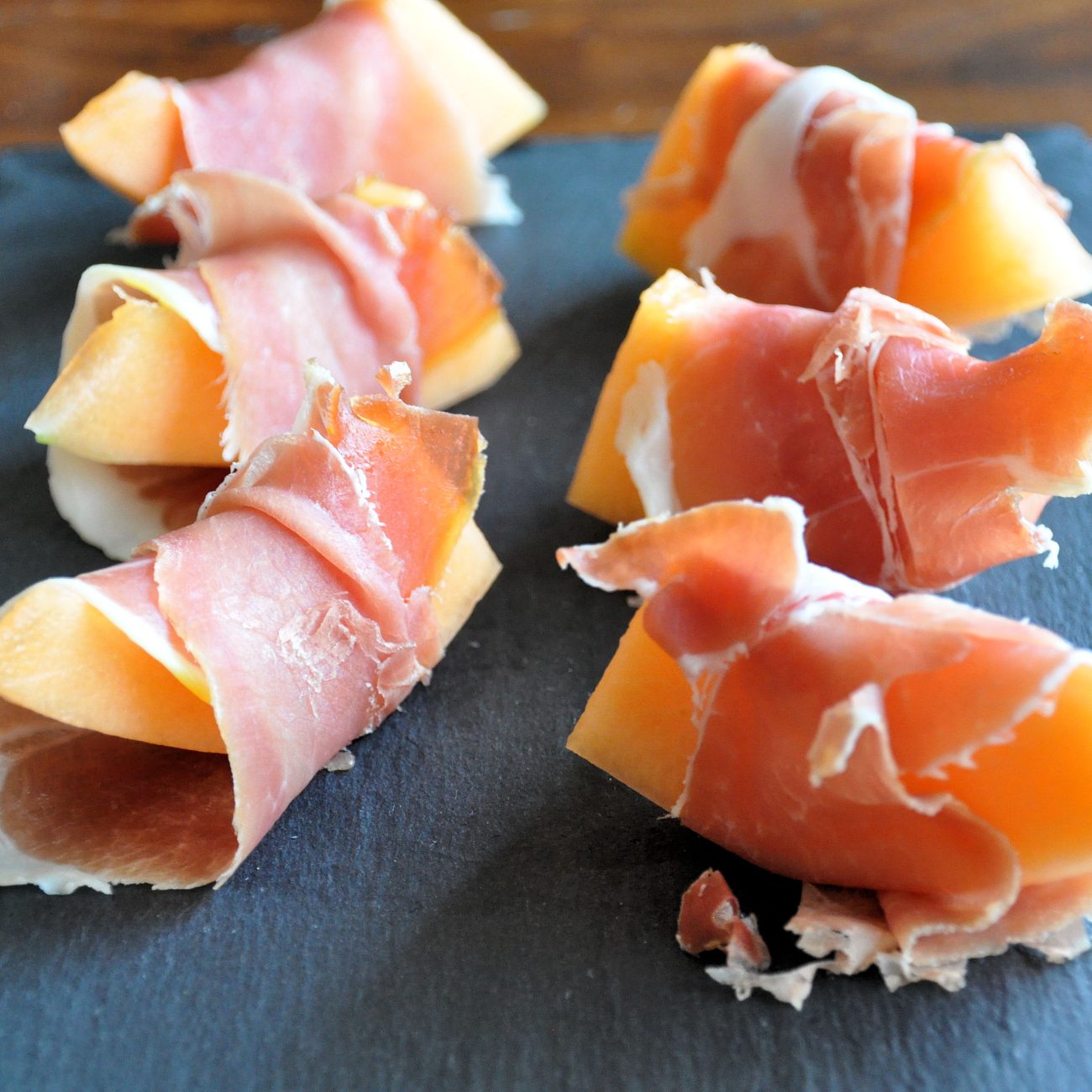 Refreshing Spanish Melon Wrapped in Serrano Ham – A Perfect Summer Delight