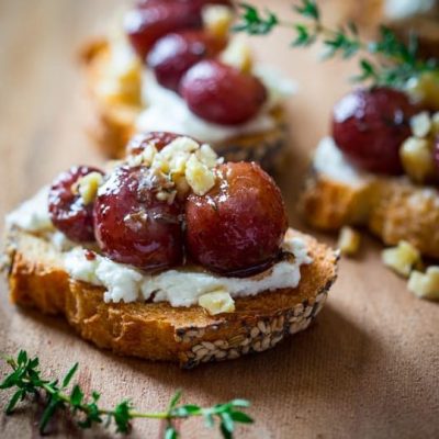 Roasted Garlic, Brie And Grape Crostini