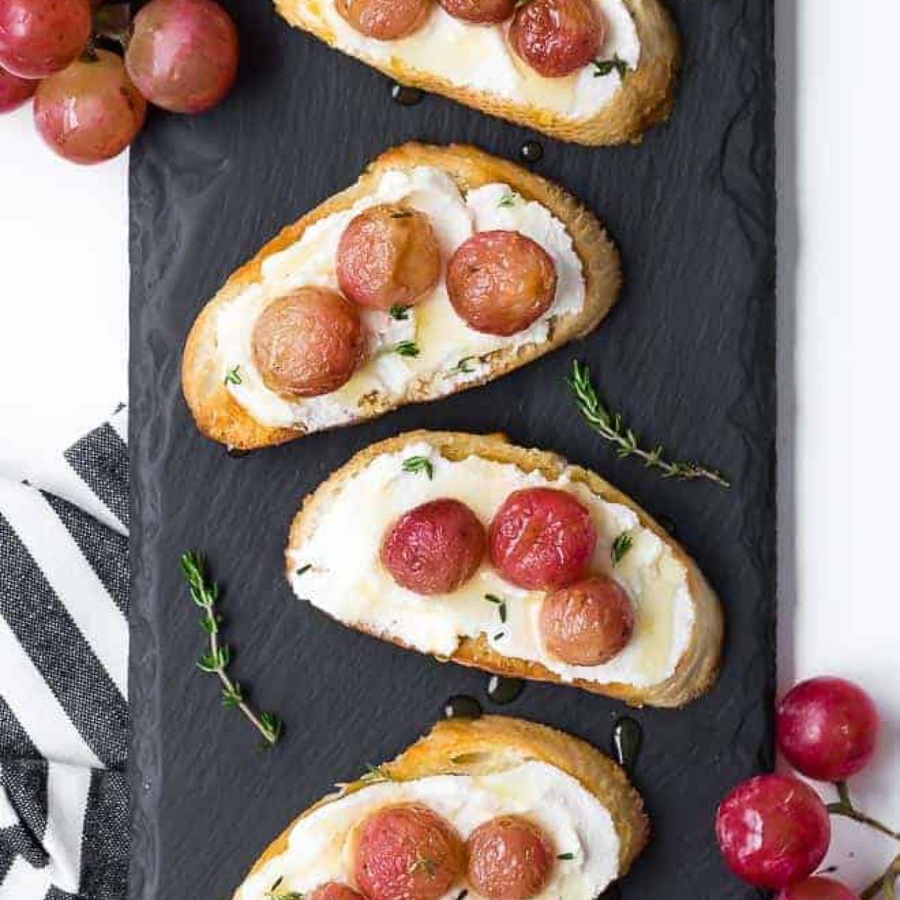 Roasted Grapes & Asiago Crostini