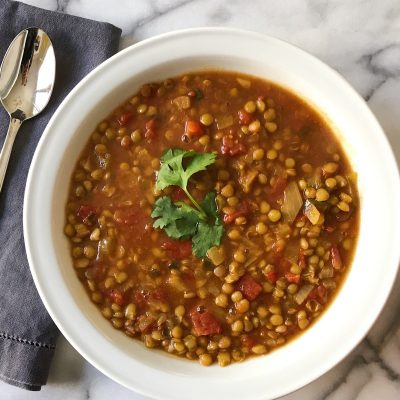 Savory Spicy Lentil Stew Paired With Homemade Cornbread